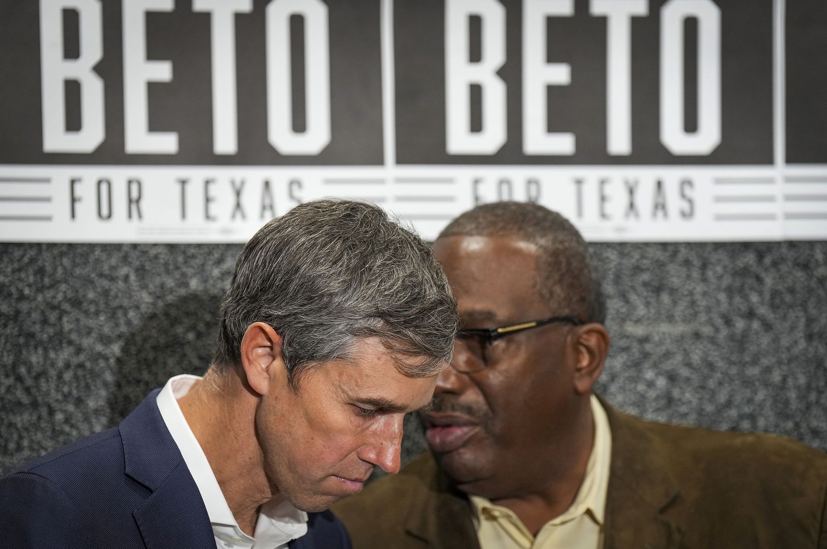 Democratic candidate for governor Beto O'Rourke listens as State Sen. Royce West whispers in his ear during a press conference following O’Rourke’s meeting with Black elected leaders at Paul Quinn College on Monday, Feb. 7, 2022, in Dallas.(Smiley N. Pool / Staff Photographer)